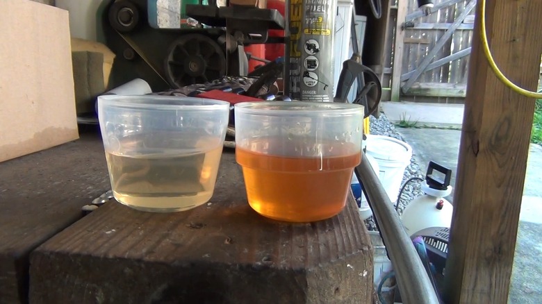 An image of two clear containers, on the left is fresh gas that is lighter in color and more clear, and on the right is expired gas, which is darker and cloudy