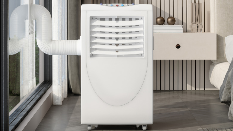 An air conditioner set up in a bedroom.