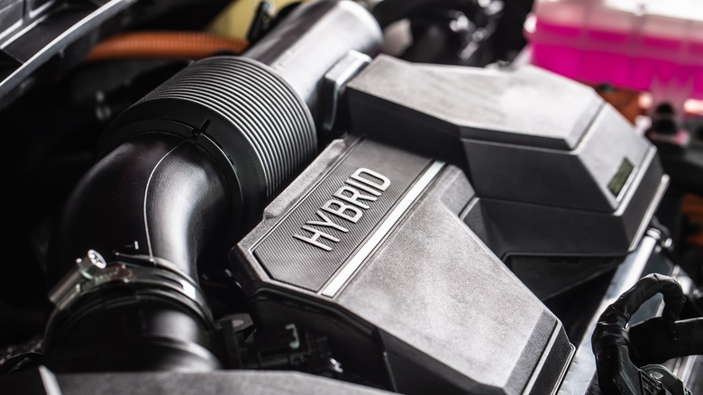 Hybrid engine under hood of car