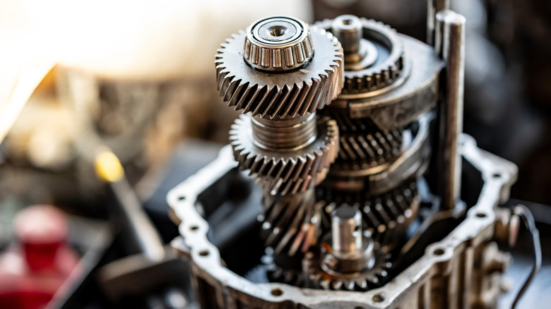 Close shot of disassembled transmission in auto repair shop