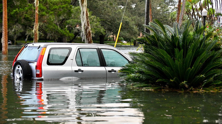 A silver first generation Honda CR-V flooded after a hurricane in Florida