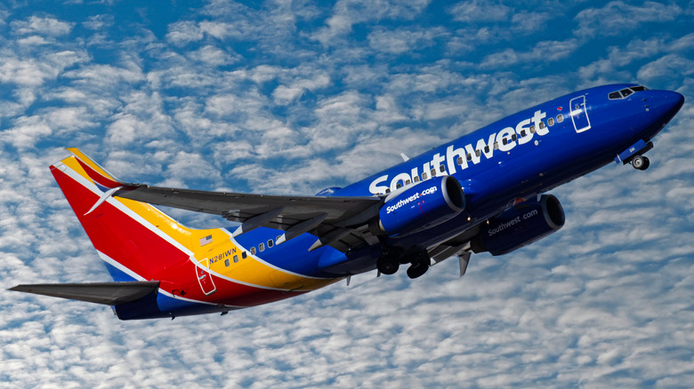 Southwest airline plane flying into sky