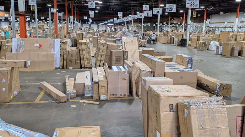 Ware filled with loosely stacked cardboard boxes