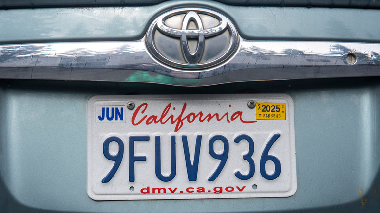 A California license plate on the back of a Toyota
