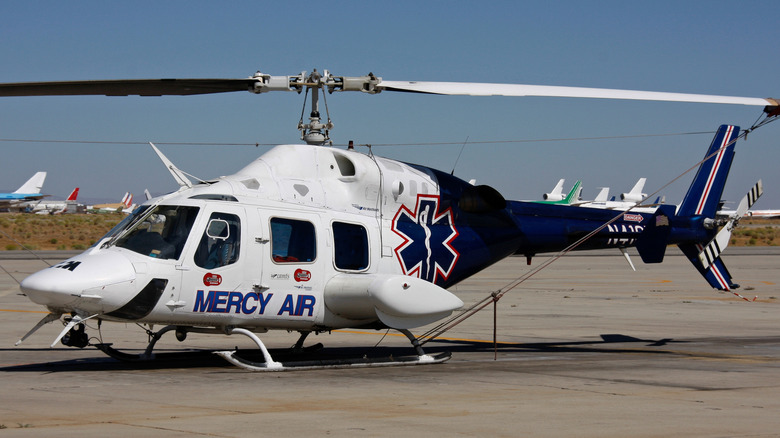A Mercy Air Bell 222 helicopter on the ground