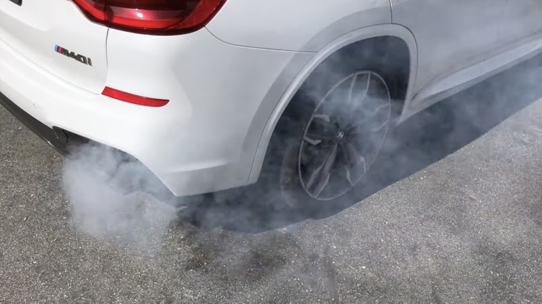 an unusual amount of smoke from a bmw exhaust