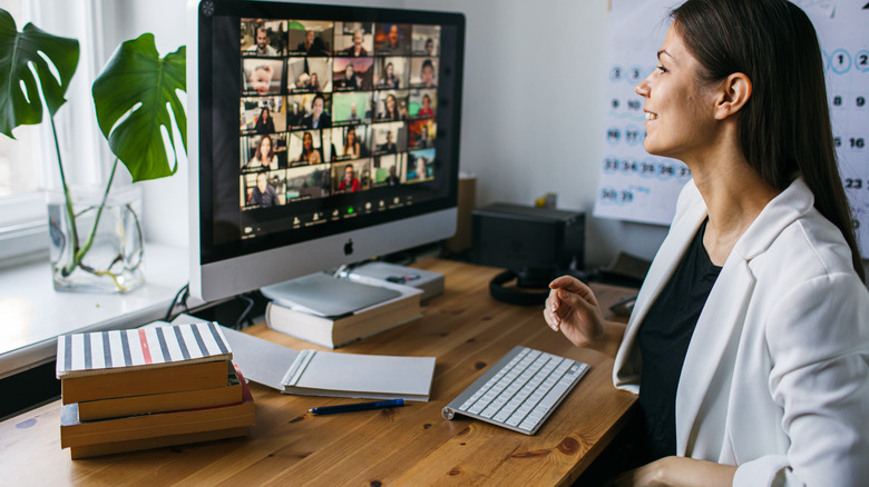 Person on video call work from home 