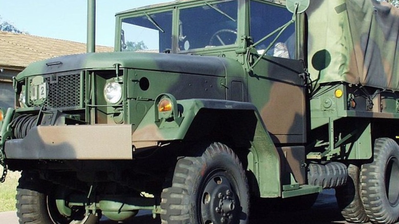 Camouflage colored Deuce and a Half military truck