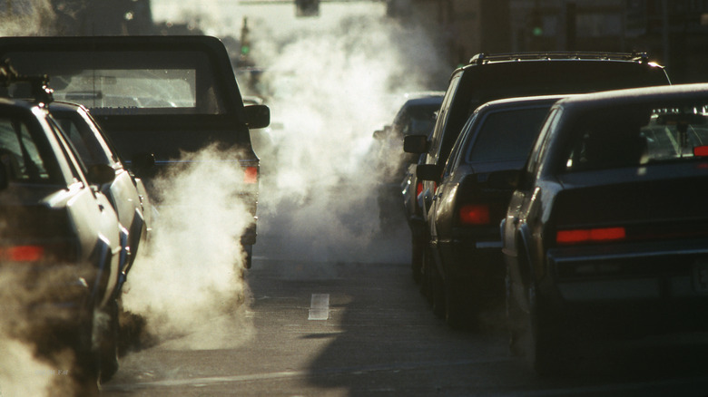 winter traffic with visible exhaust