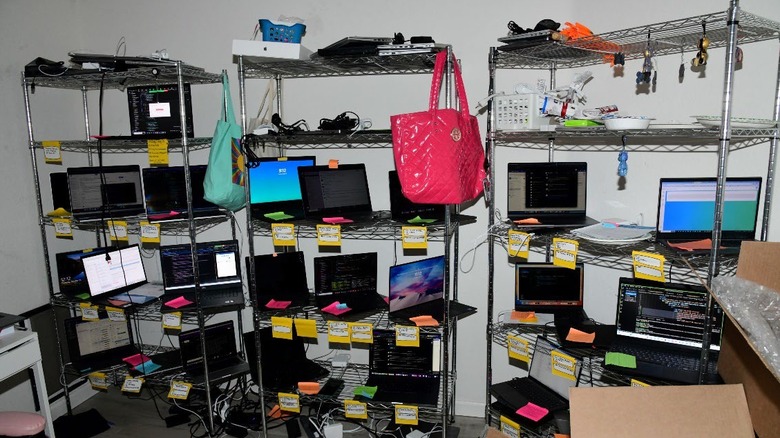 Part of Christina Chapman's laptop farm, photographed during a 2023 raid of her home.
