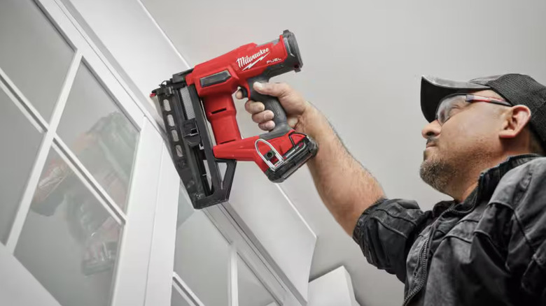 Milwaukee M18 Fuel 16-Gauge Straight Finish Nailer in use