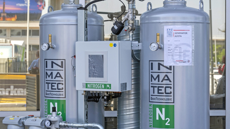 A nitrogen gas generator reservoir tank in an outdoor industrial setting