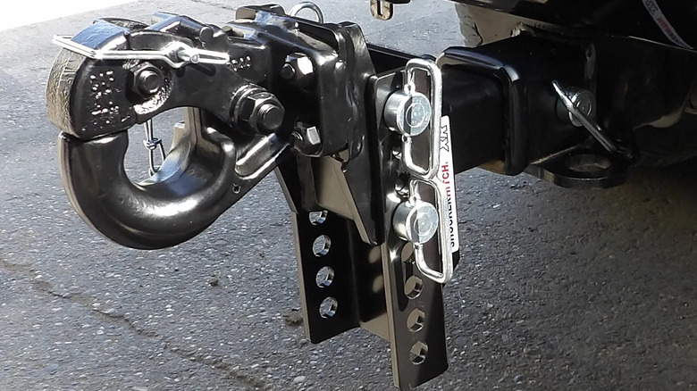 An image of a pintle hitch mounted on a truck