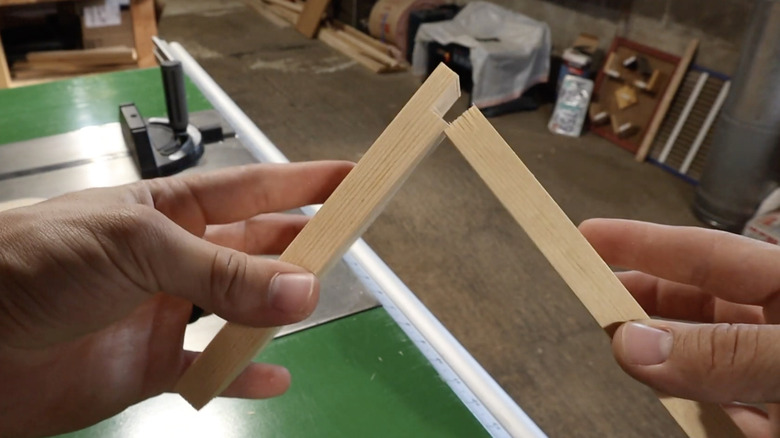 man builds a rabbet joint