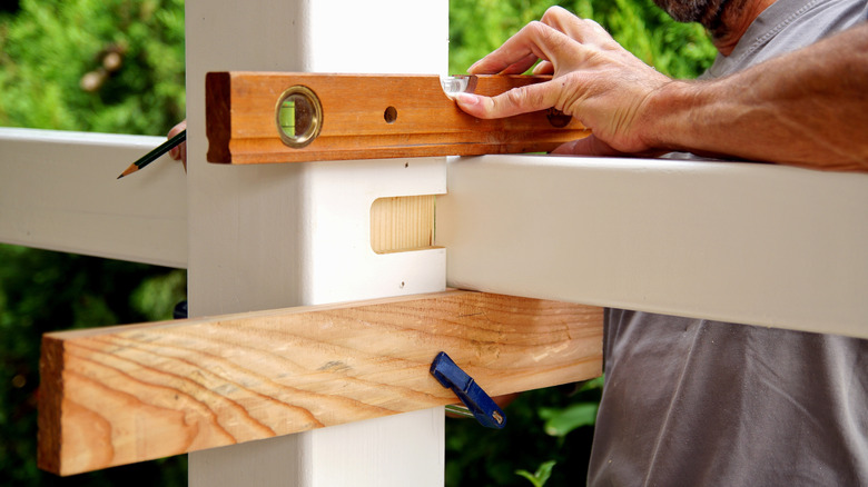 man woodworking on a rabbet joint