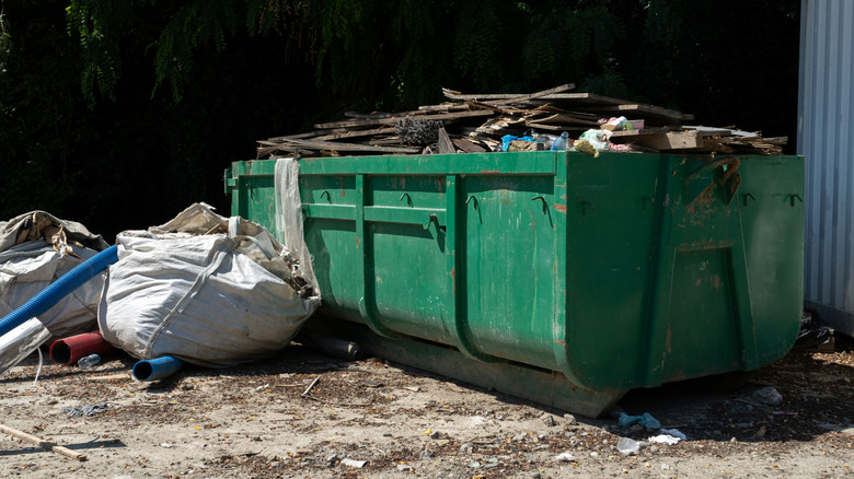 Roll-off dumpster at site