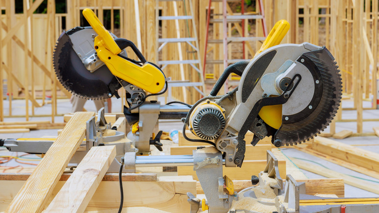 Two miter saws in construction site