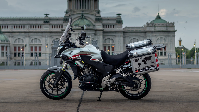 Honda 500 Twin parked outside a building