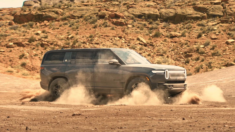 Rivian performing a Kick Turn in a desert landscape