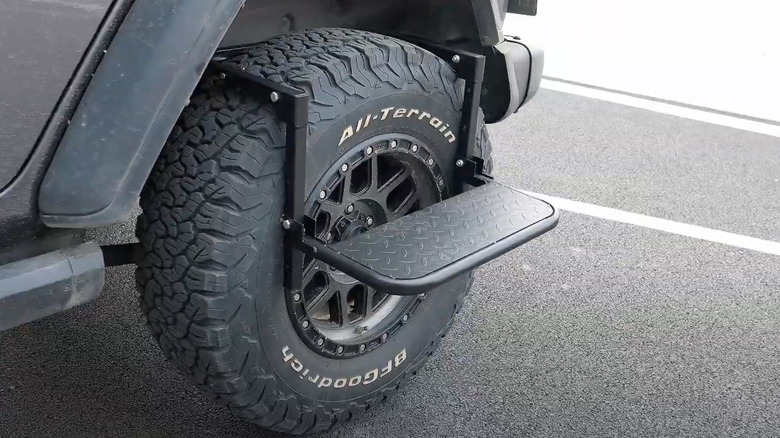 A tire step affixed to a Goodrich tire