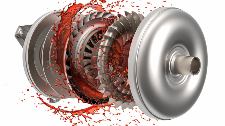 Rendering of an exploded torque converter with splashing red transmission fluid inside