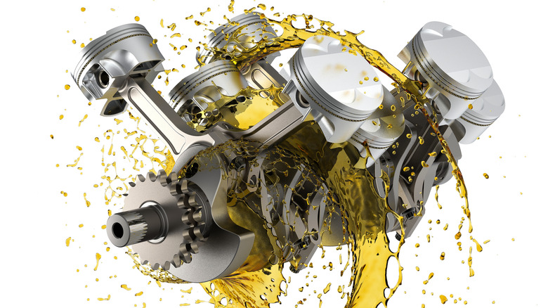 3D rendering showing internal view of pistons of a V6 engine splashed with oil