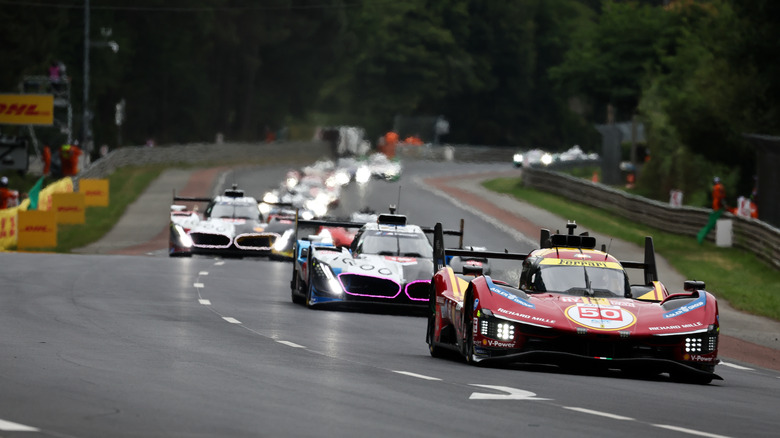 Le Mans hypercars on the track, front view