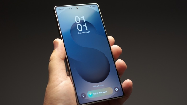 a Samsung S25 Ultra in hand