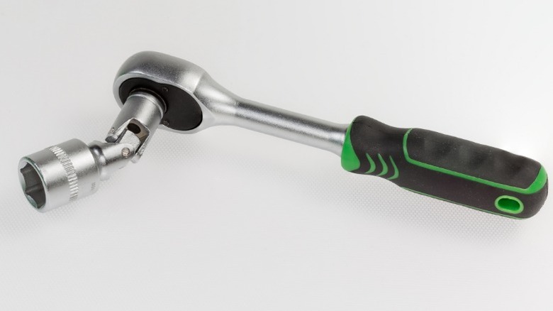 a rachet with a universal joint socket attached