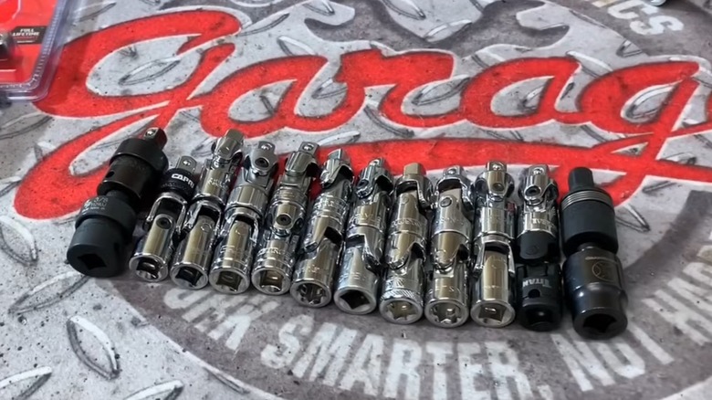 a collection of different universal joint socket extensions (including impact-rated and chrome vanadium versions)