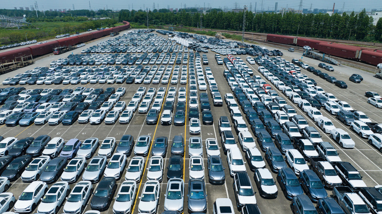 Chinese cars in large lot awaiting shipping