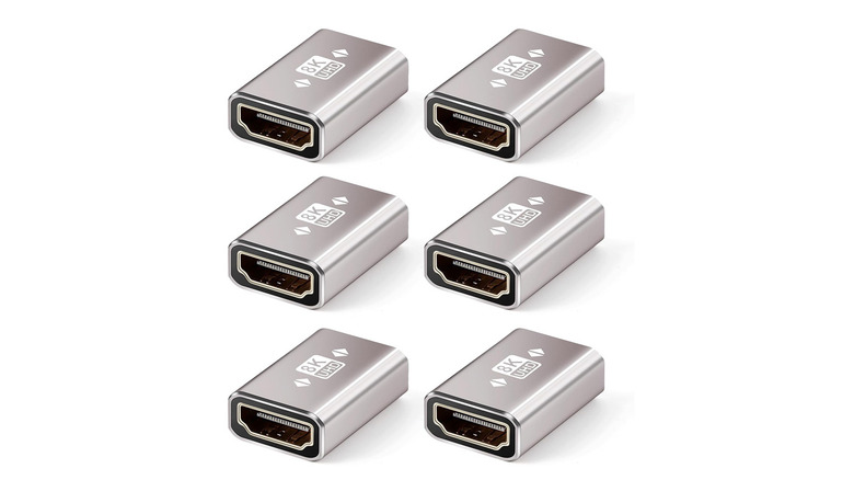 Six 8K HDMI couplers arranged on a plain white background.