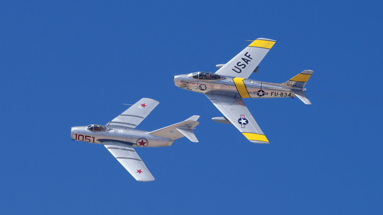 Two Mig-25 interceptor jets flying together