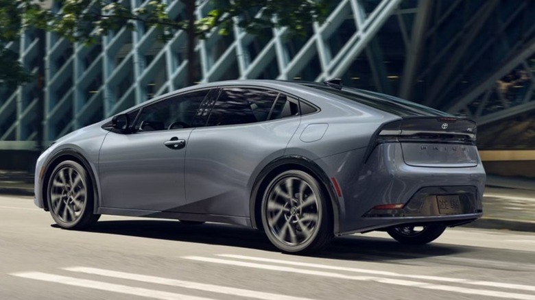 silver Toyota Prius driving in city