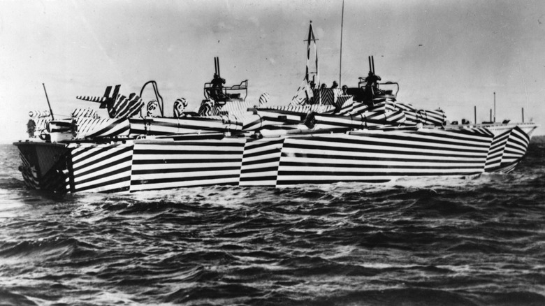 A US Navy ship with zebra stripe camouflage 
