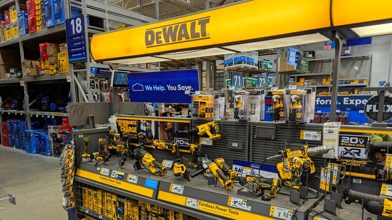 Dewalt power tools for sale in a hardware store, drills, grinders, and sanders
