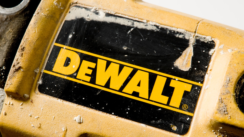 Close-up view of a DeWalt logo on a scratch tool