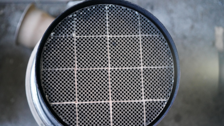 Close-up of clean DPF looking inside the tube at a baffle