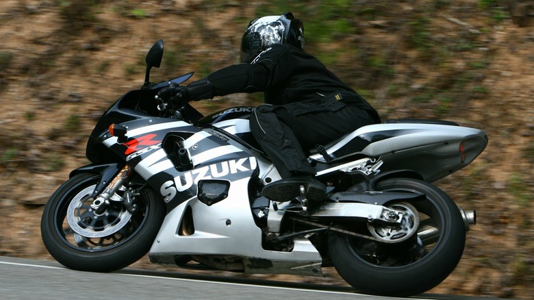 Person turning right on Suzuki GSX-R on the street