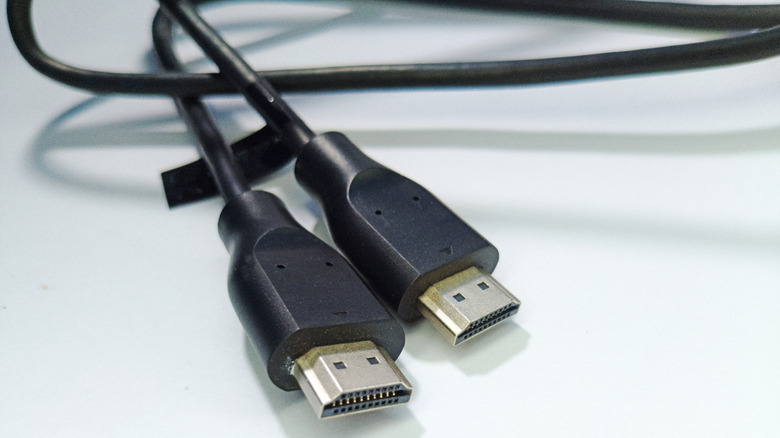 A closeup of two black HDMI cables next to each other