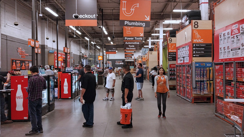 Home Depot shoppers line up to check out.