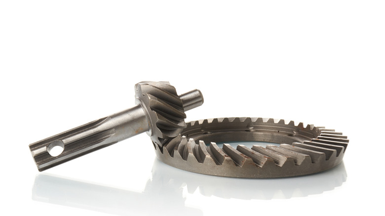 Beveled spiral gearset including input shaft interacting with ring gear on a white background