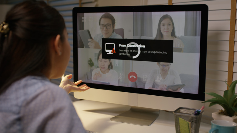 Woman in video conference facing poor connection error