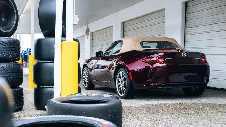 Rear view Mazda MX-5 parked at race track