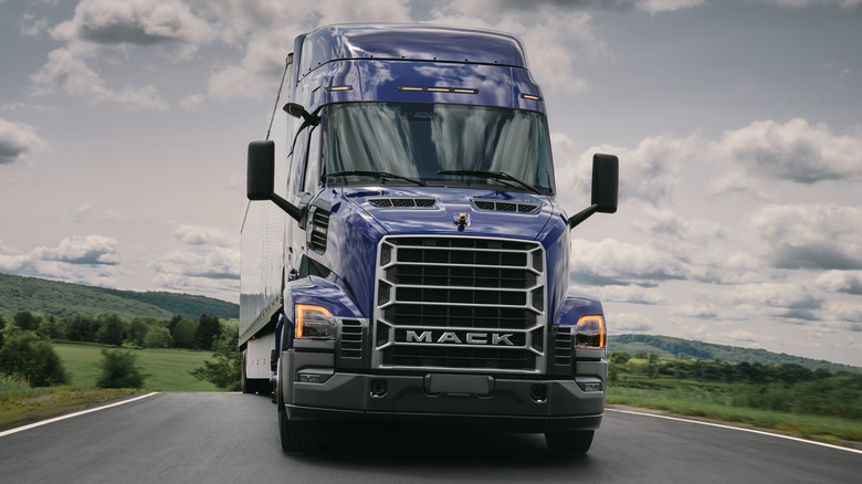 Blue Mack Anthem semi-truck on the road