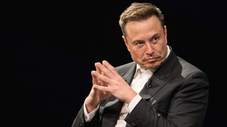 Elon Musk looking like a budget movie villain