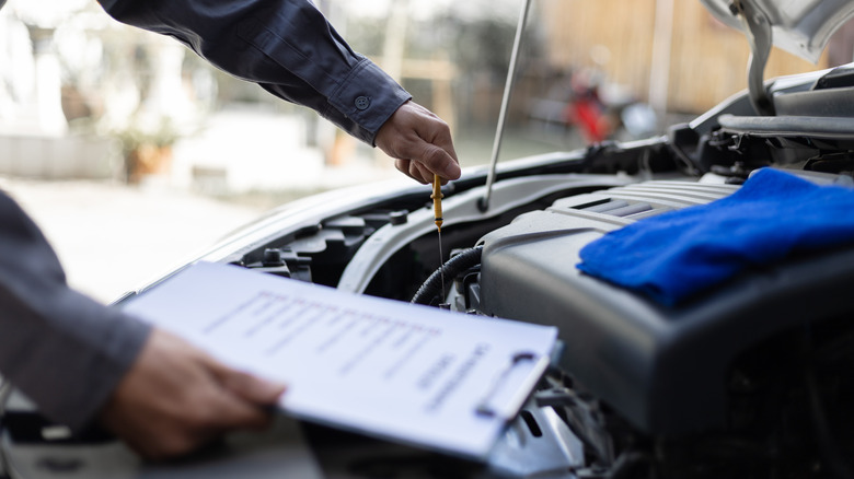 Mechanic doing engine maintenance