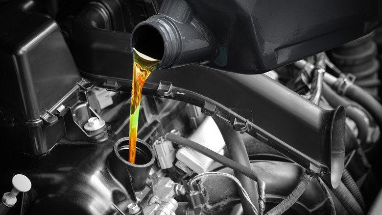 Oil being poured into engine