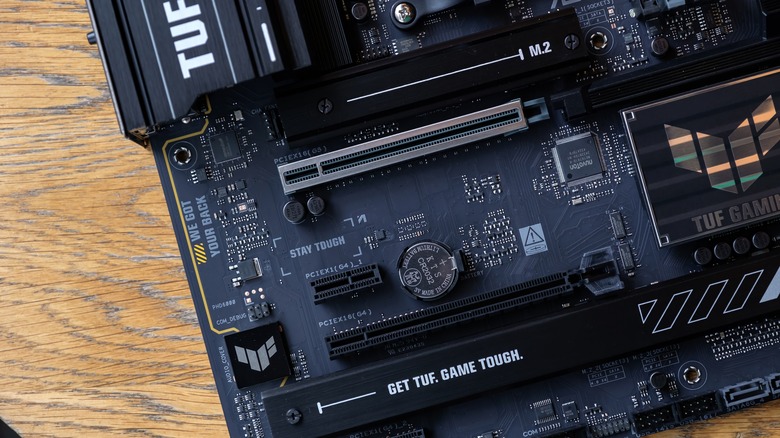 An Asus Tuf AM5 motherboard with two M.2 and three PCIe slots
