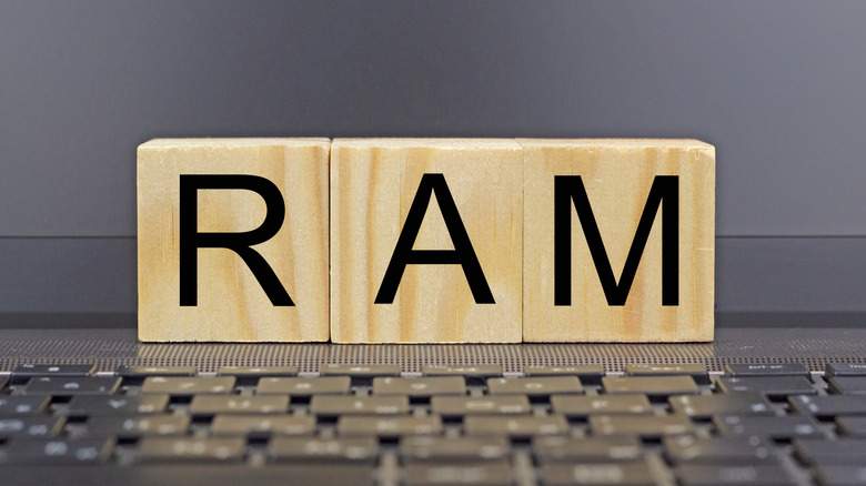 Cubes on laptop keyboard spelling RAM